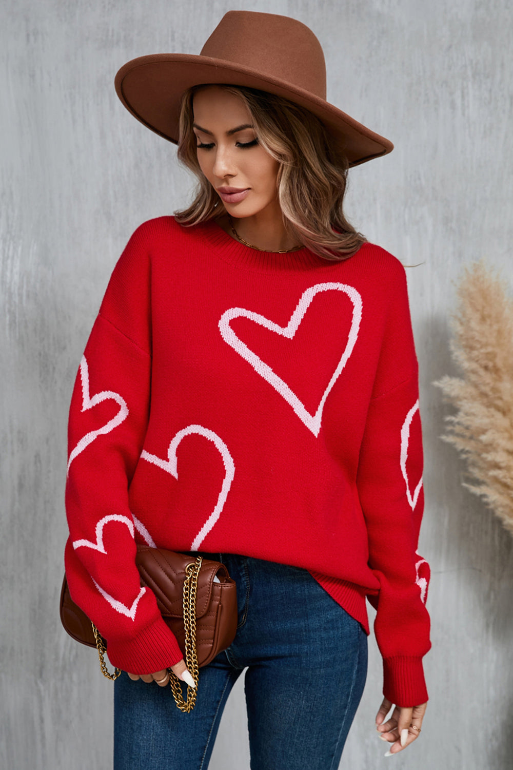 Women's hollow heart dropped shoulder sweater