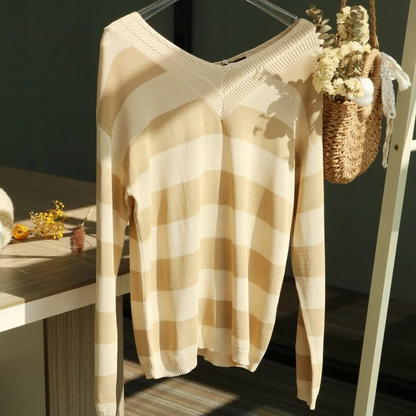 Trendy striped women's sweater with loose fit v-neck design
