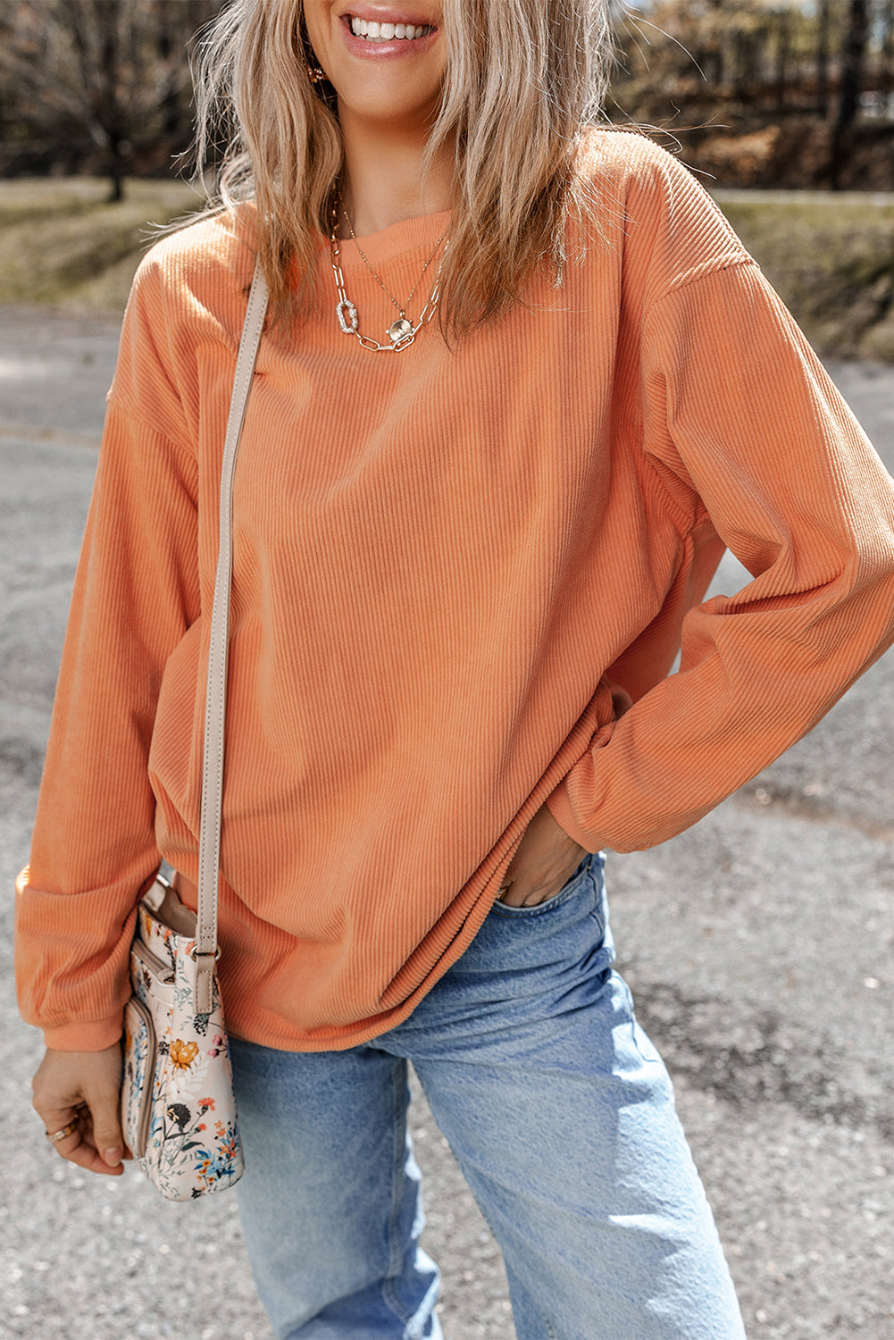 Oversized orange pullover sweatshirt for women