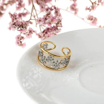 Irregular hollow daisy ring