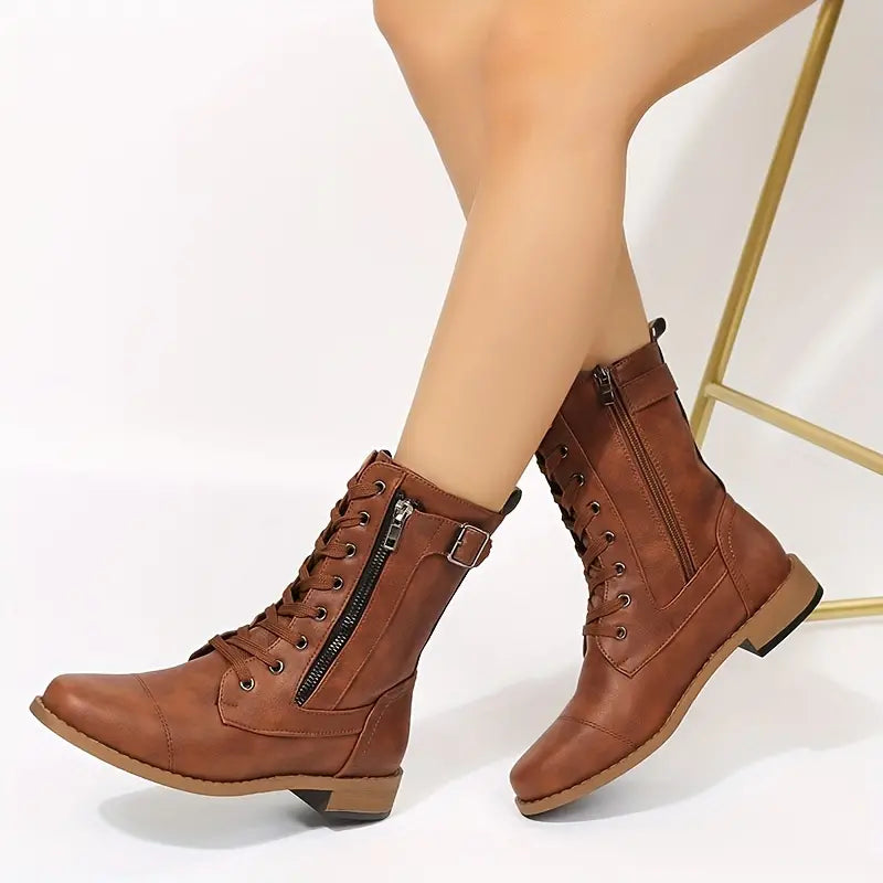 Women's low-cut lace-up boots with zipper closure