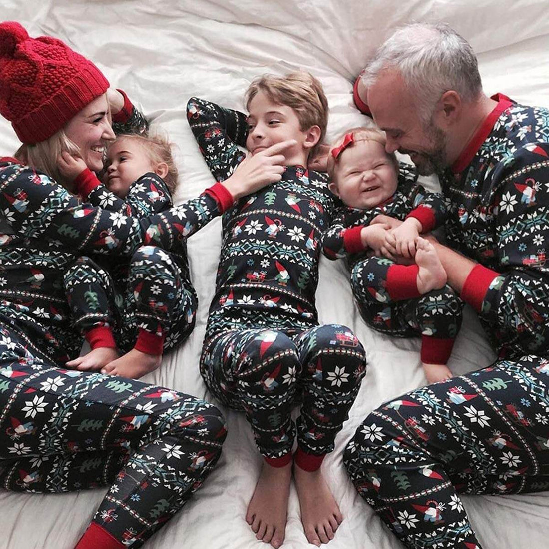 Festive family matching pajamas set with holiday patterns