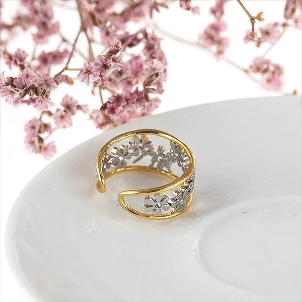 Irregular hollow daisy ring