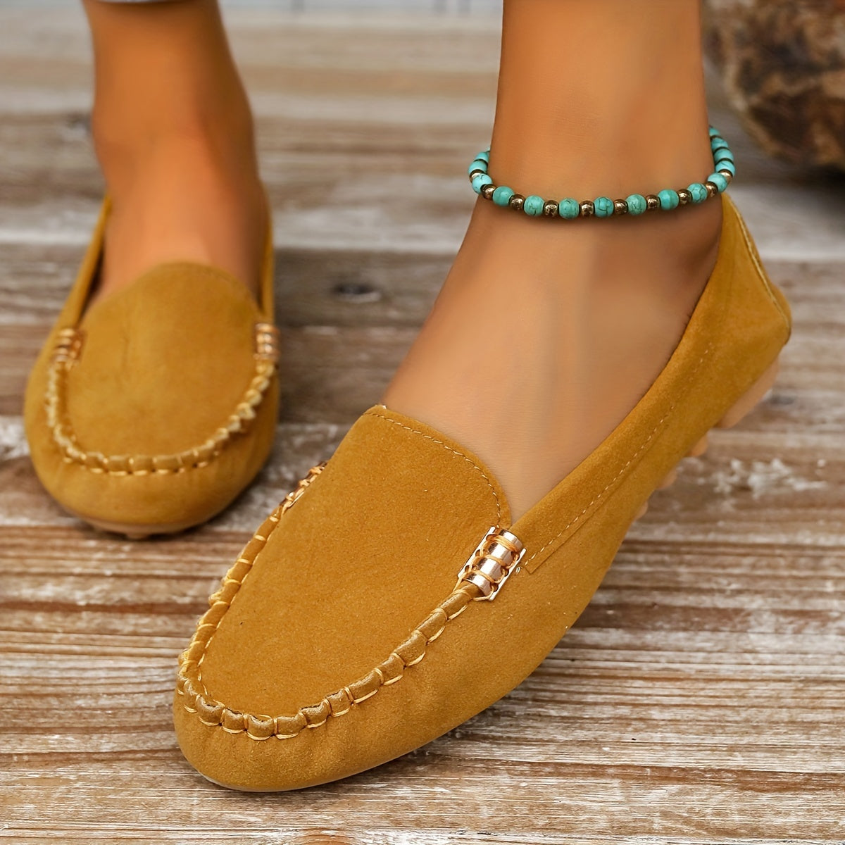 Slip-on moccasin loafers with decorative stitching for women