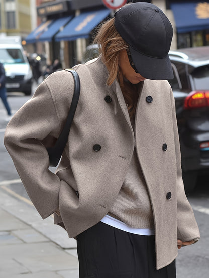 Timeless double-breasted coat with stand collar and elegant design for women