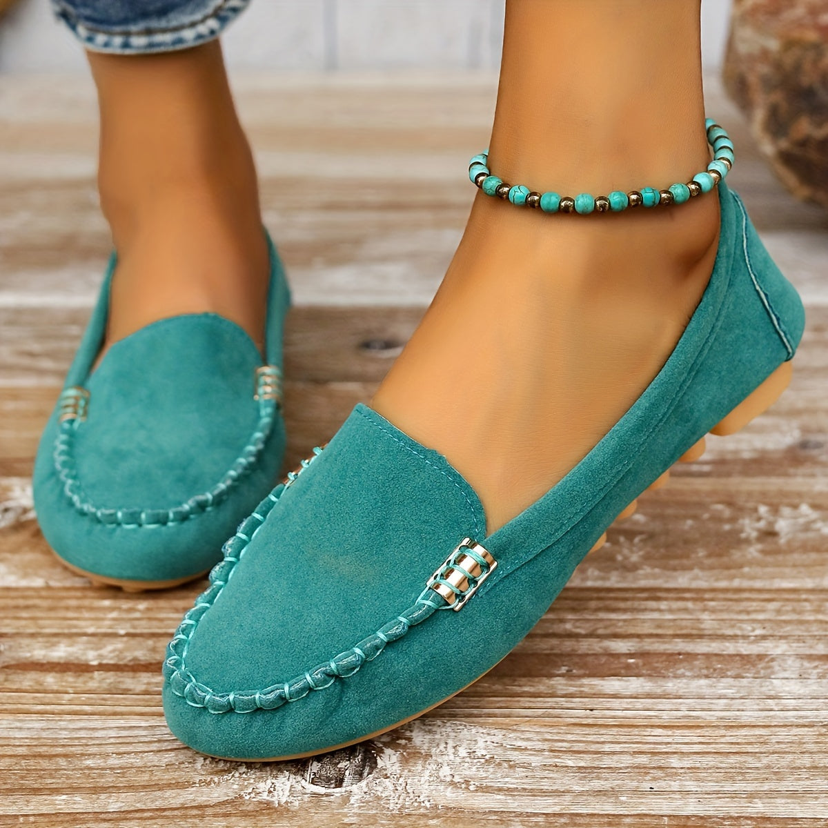 Slip-on moccasin loafers with decorative stitching for women
