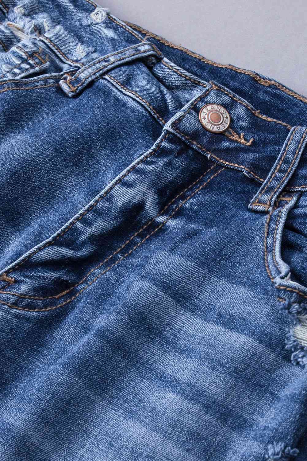 Kamaria -  distressed flared jeans with pockets