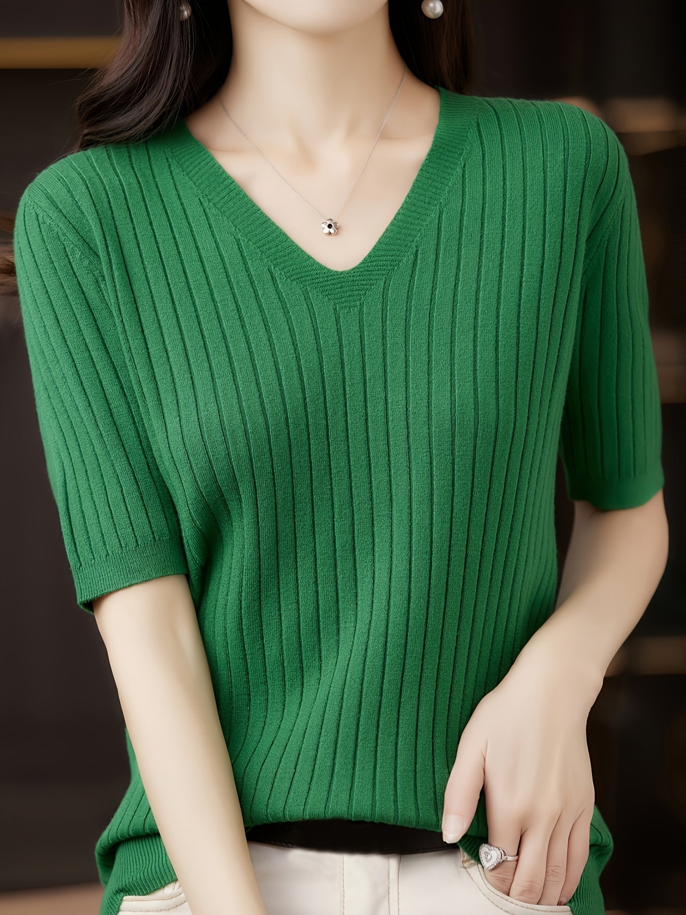 Stylish ribbed knit v-neck top with short sleeves and flattering fit for women