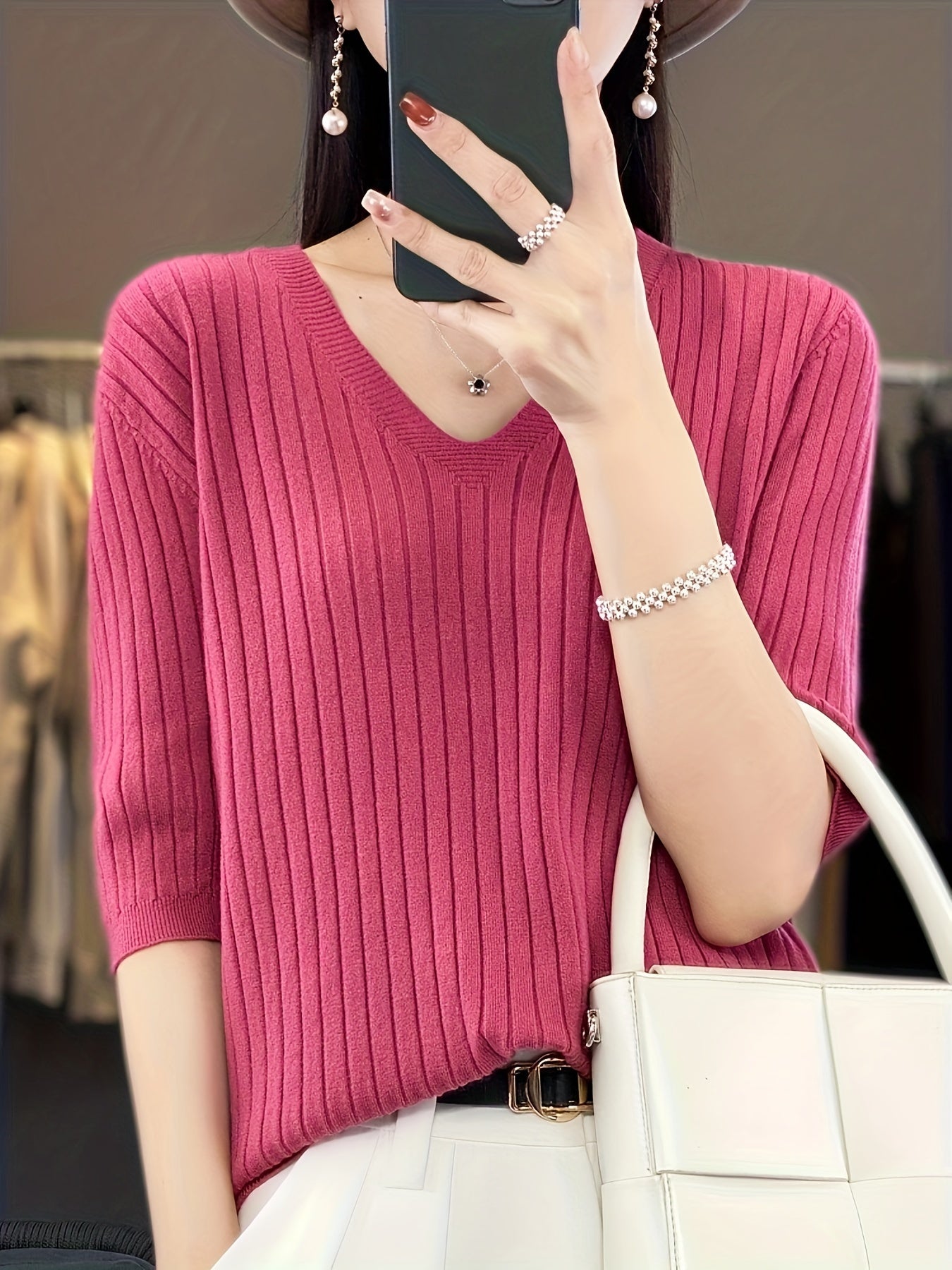 Stylish ribbed knit v-neck top with short sleeves and flattering fit for women
