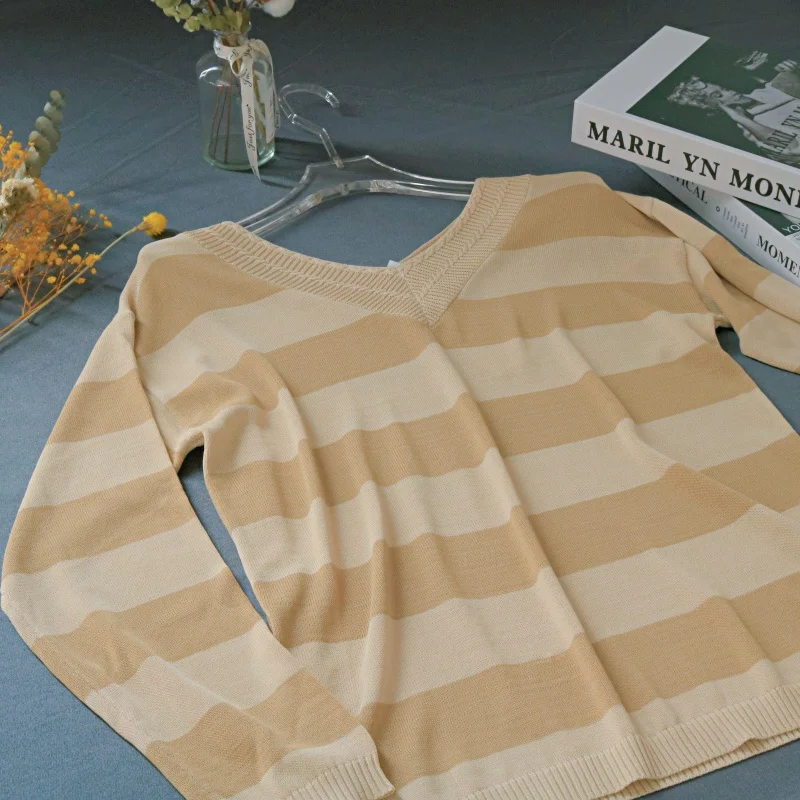 Trendy striped women's sweater with loose fit v-neck design