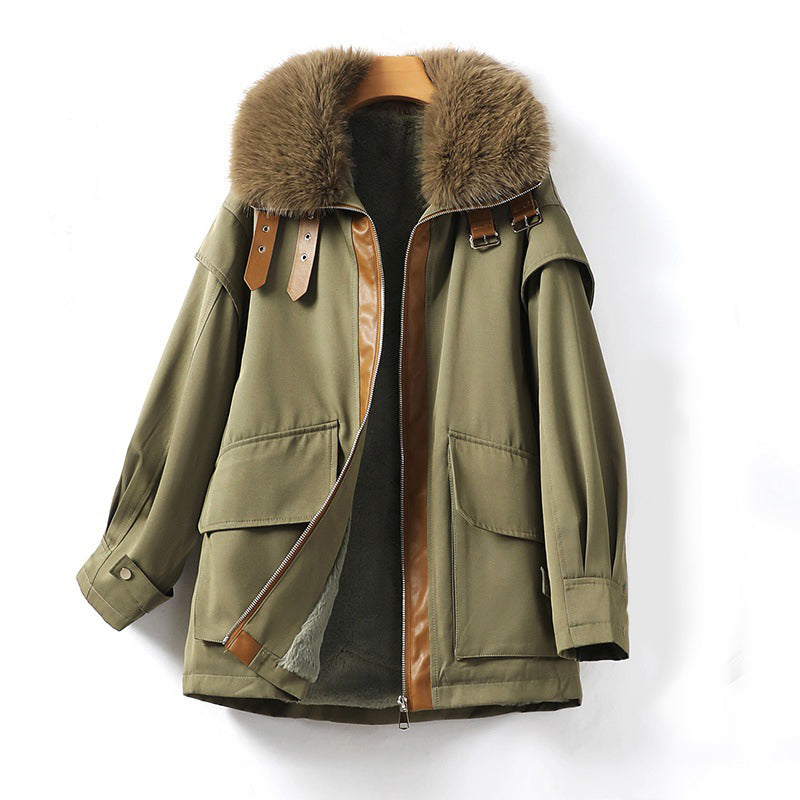 Women's parka with large fur collar zipper closure and oversized pockets