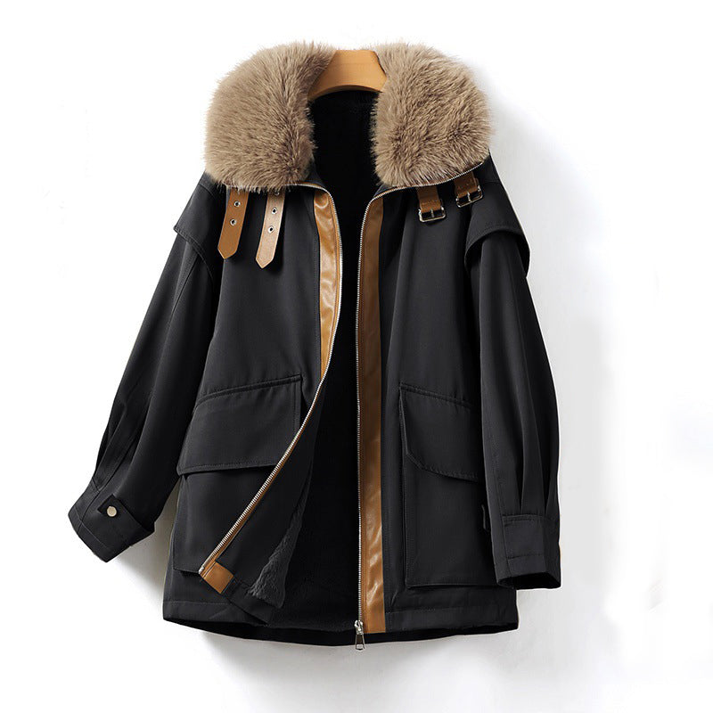 Women's parka with large fur collar zipper closure and oversized pockets