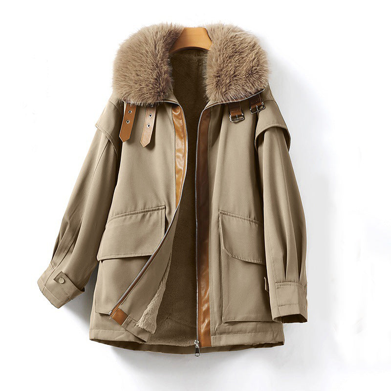 Women's parka with large fur collar zipper closure and oversized pockets