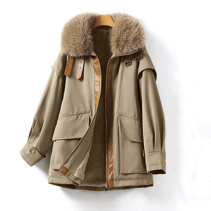 Women's parka with large fur collar zipper closure and oversized pockets