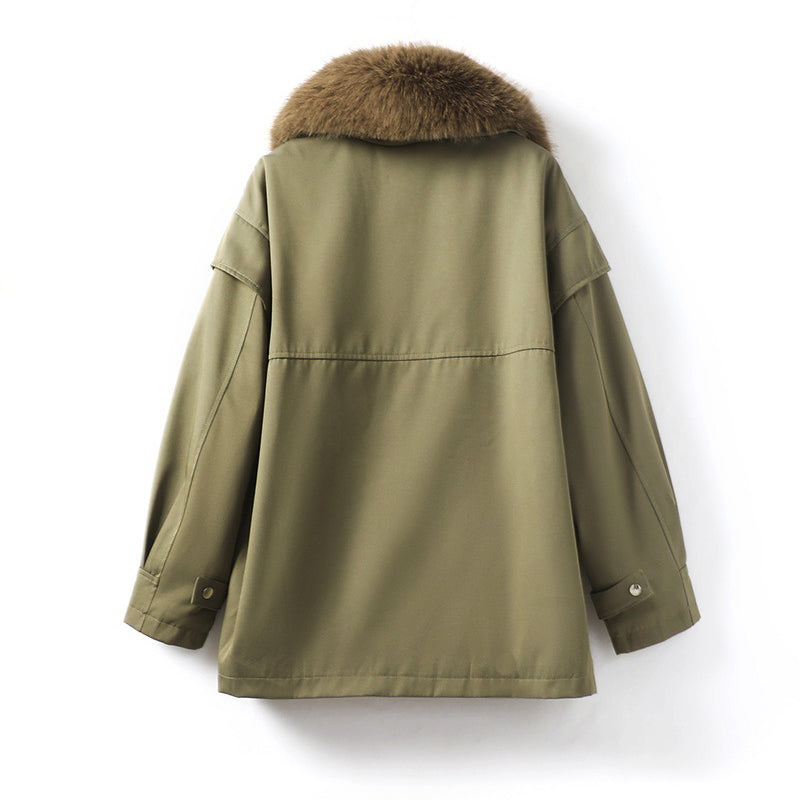 Women's parka with large fur collar zipper closure and oversized pockets