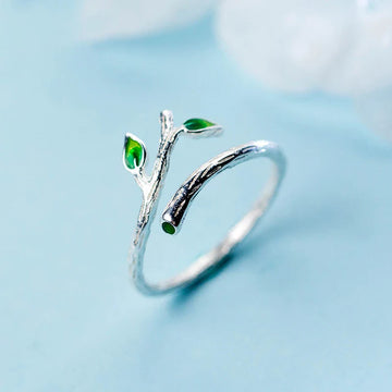 Green leaves tree branch ring