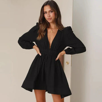 Women's Romper - Deep V-Neck - Long Puff Sleeves - Cinched Waist - Flowy Short Fit