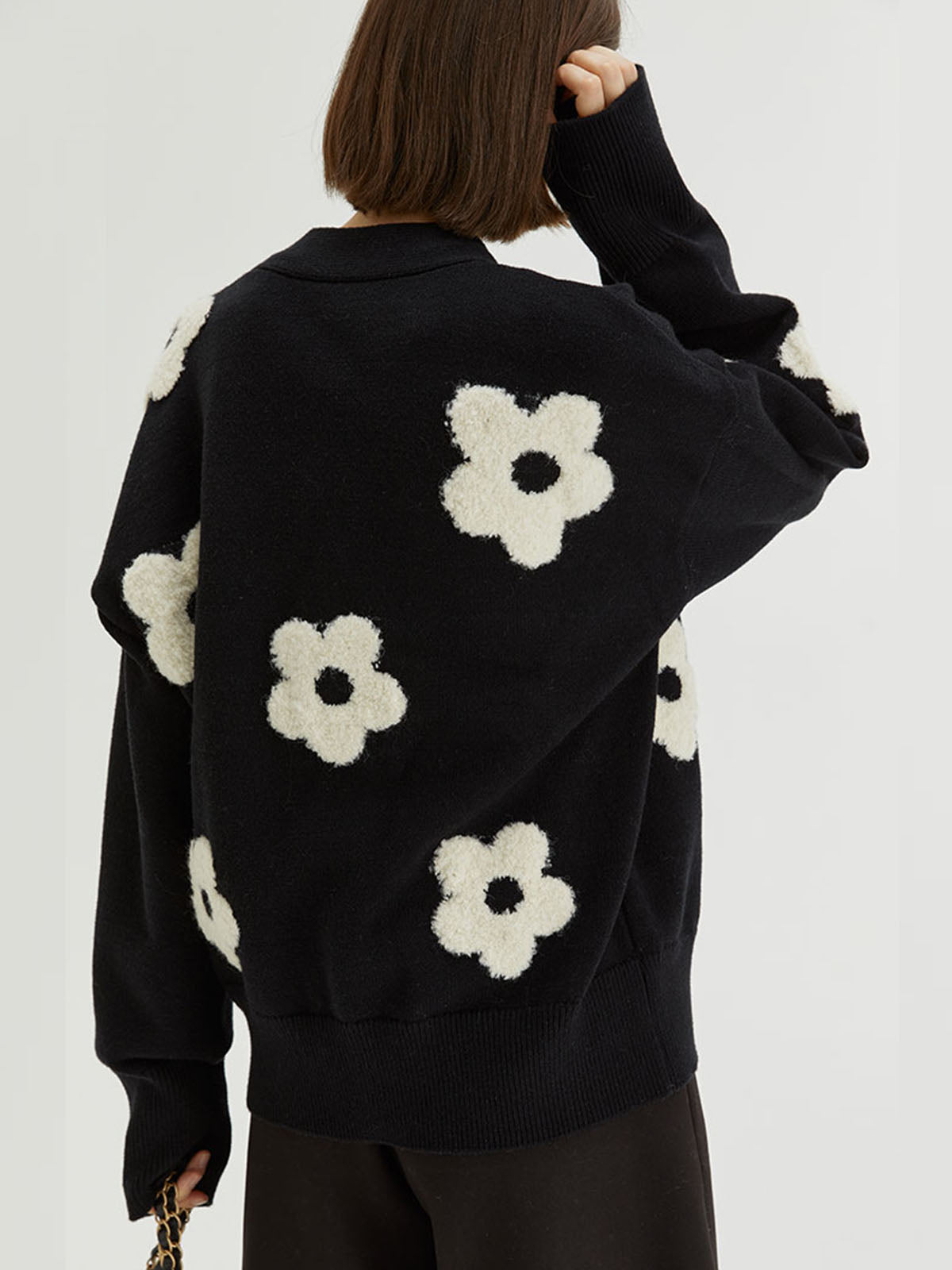 Floral knit cardigan with oversized flower pattern
