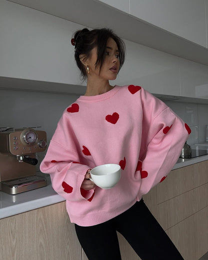 Women's solid color round neck knitted sweater with heart print