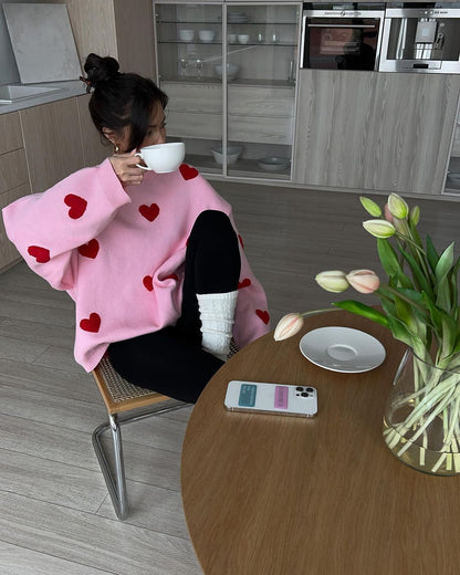 Women's solid color round neck knitted sweater with heart print