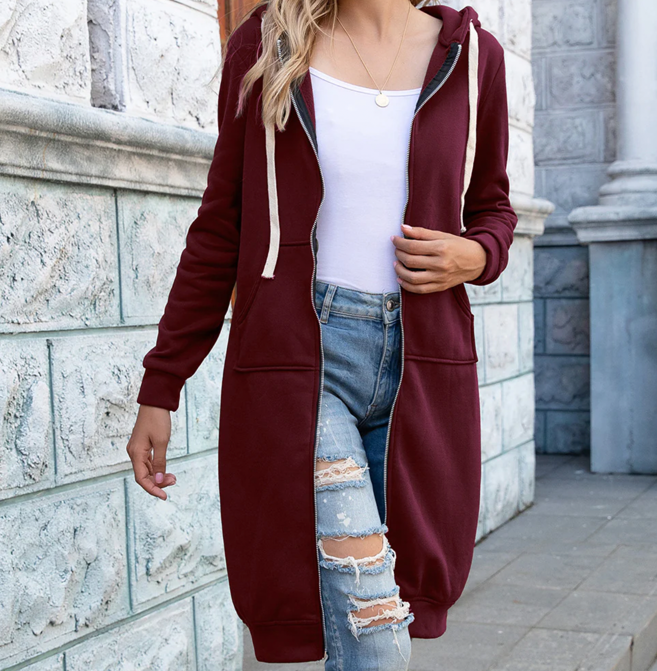 Women's loose hooded mid length casual sweater