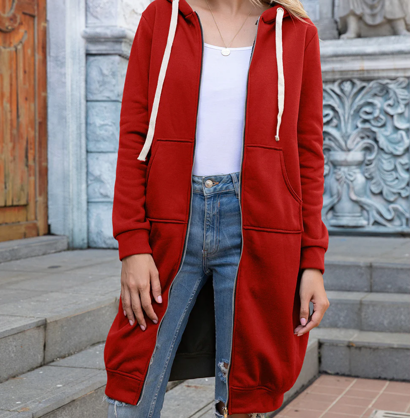 Women's loose hooded mid length casual sweater