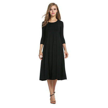 Women's A-Line Midi Dress - Flowy Fabric - Round Neck - Three-Quarter Sleeve