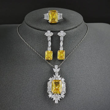 Necklace and earrings set with yellow crystal