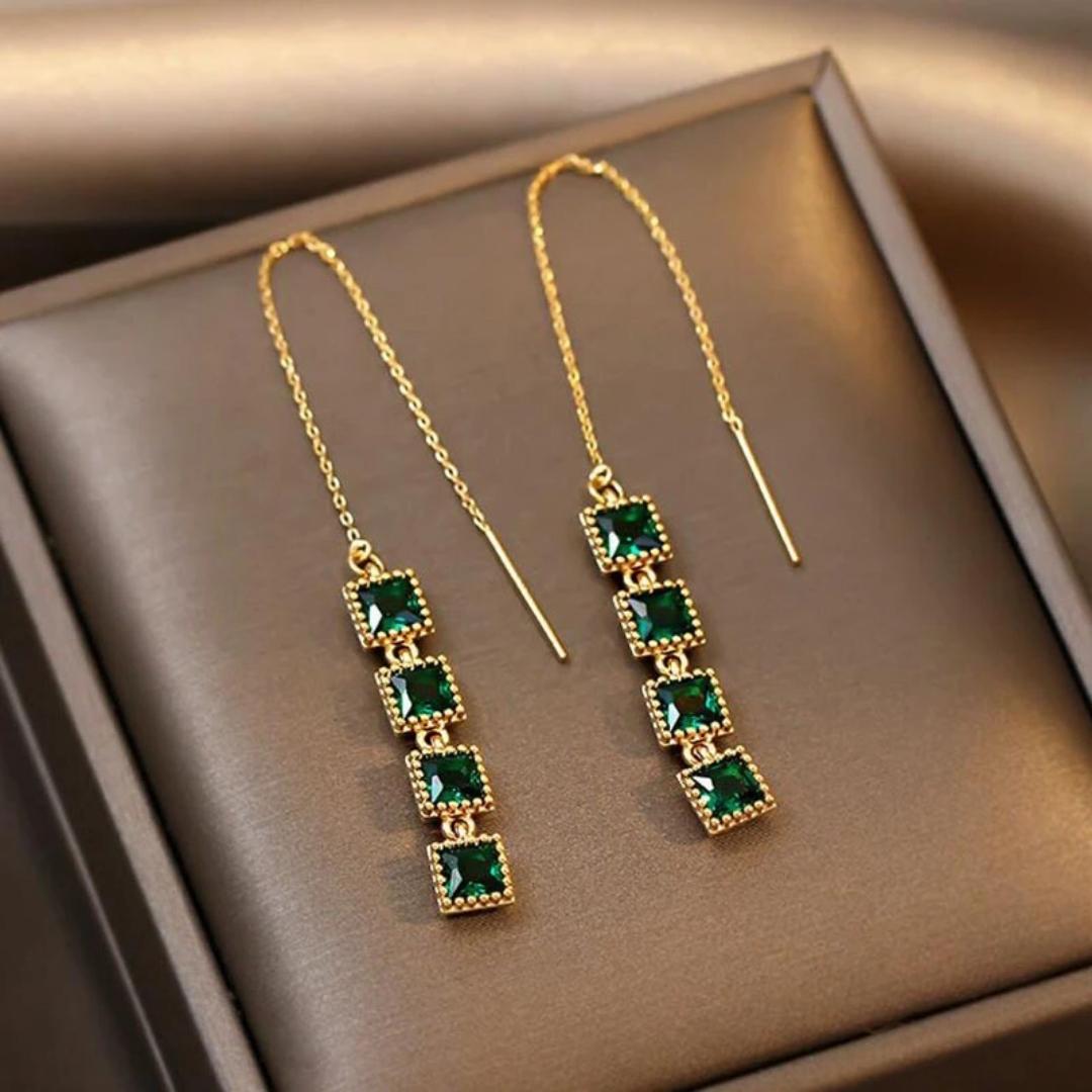 Golden drop earrings with green zirconia