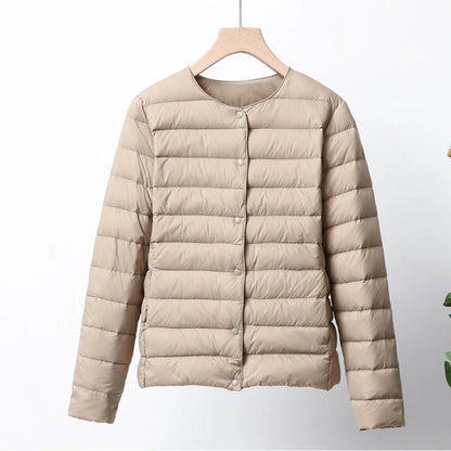 Misha - packable puffer jacket with snap closure