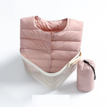 Misha - packable puffer jacket with snap closure