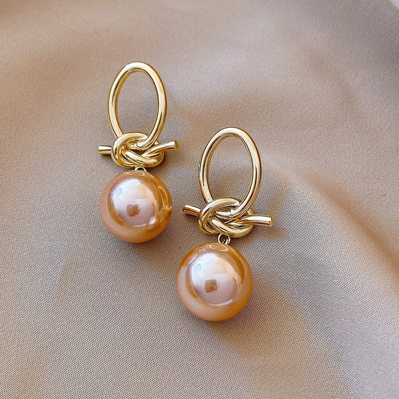 Timeless pearl bow earrings