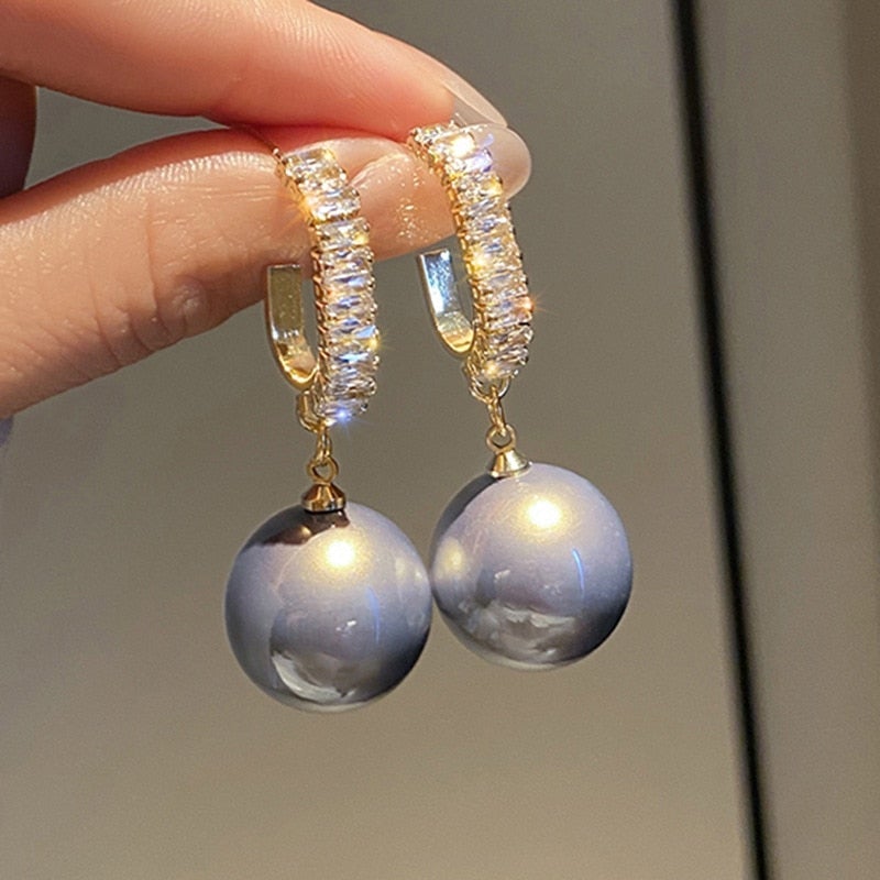 Elegant large pearl drop earrings