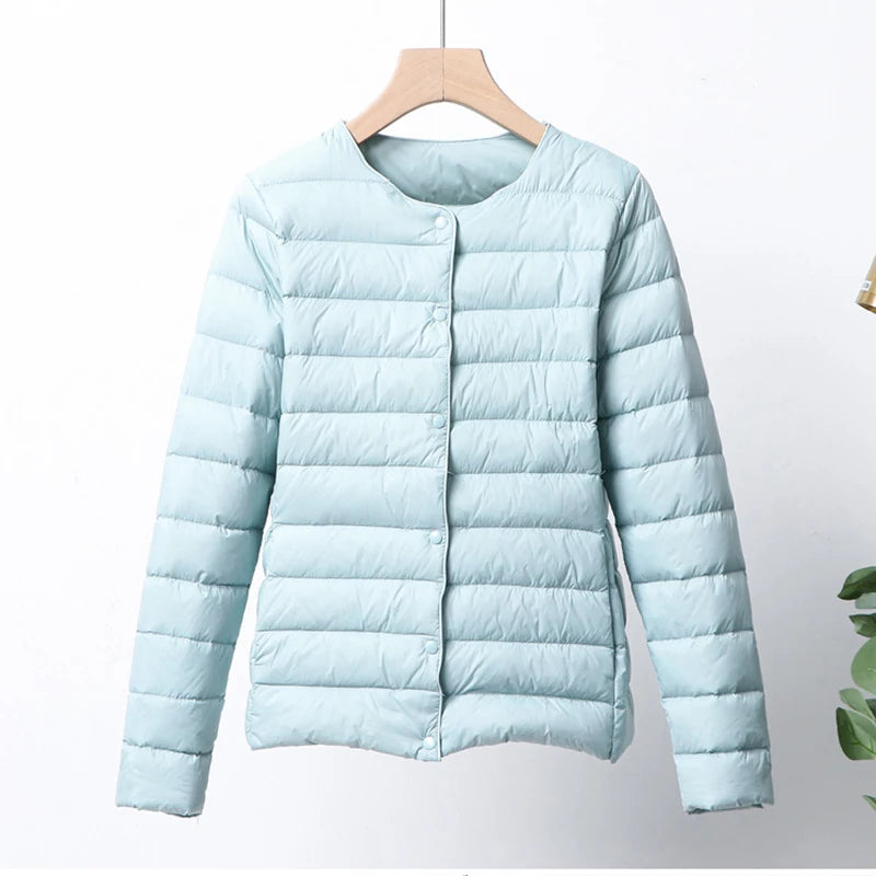 Misha - packable puffer jacket with snap closure