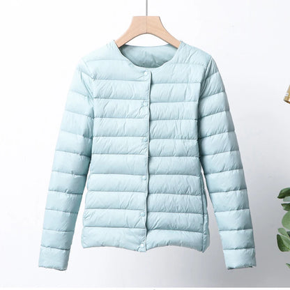 Misha - packable puffer jacket with snap closure