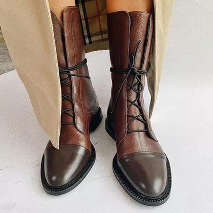 Women's biker boots with cross strap design