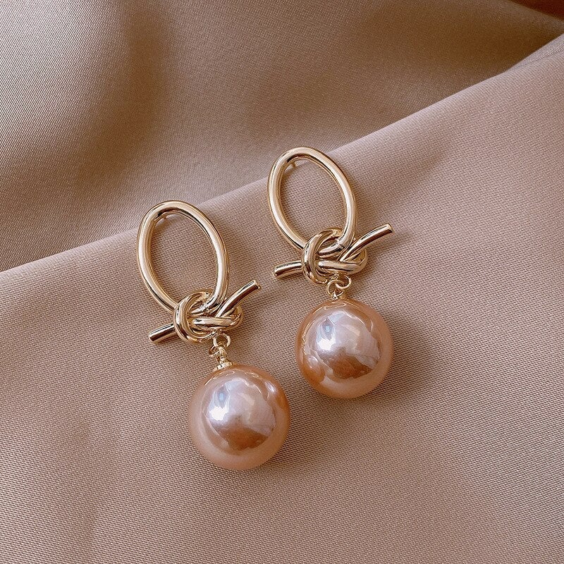 Timeless pearl bow earrings