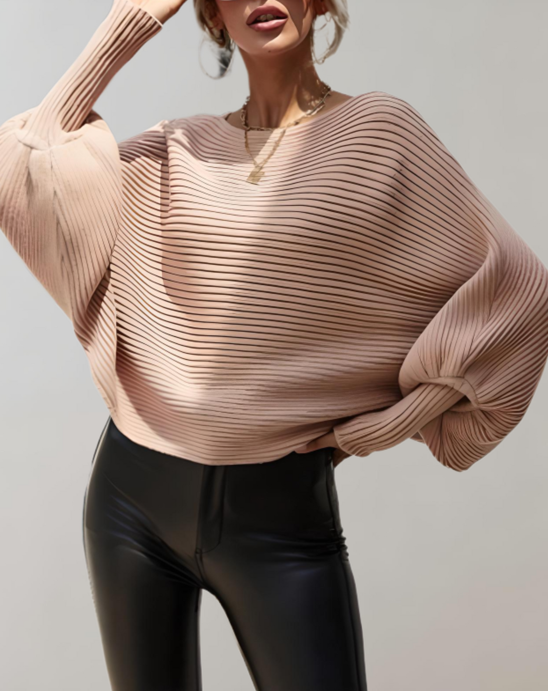 Women’s elegant sweater with puff sleeves