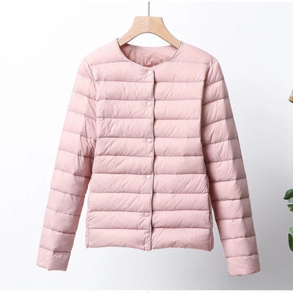 Misha - packable puffer jacket with snap closure