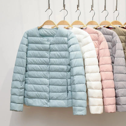 Misha - packable puffer jacket with snap closure
