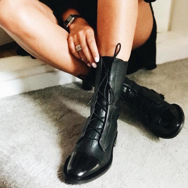 Women's biker boots with cross strap design