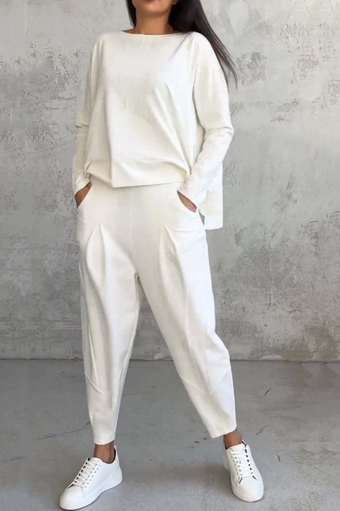 Women's high low hem sweatshirt and cropped trouser set