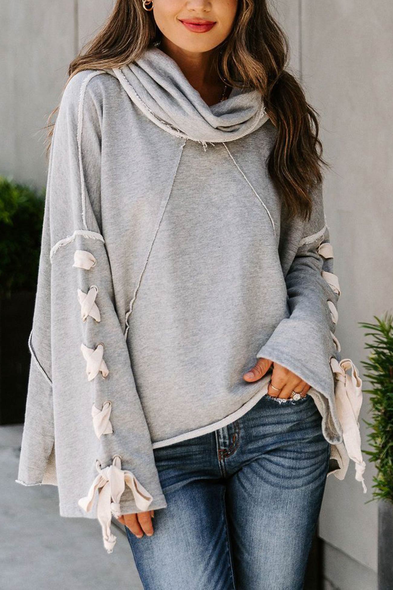 Women's lace-up stacked collar raw edge hoodie