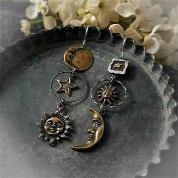 Sun and moon pendant earrings