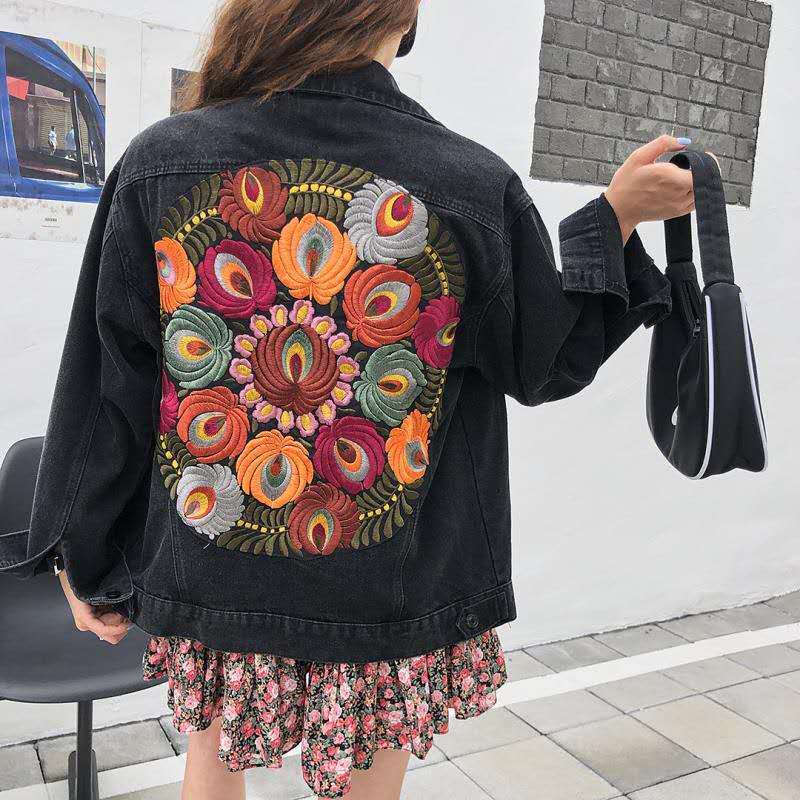 Women's casual denim jacket with embroidered back design