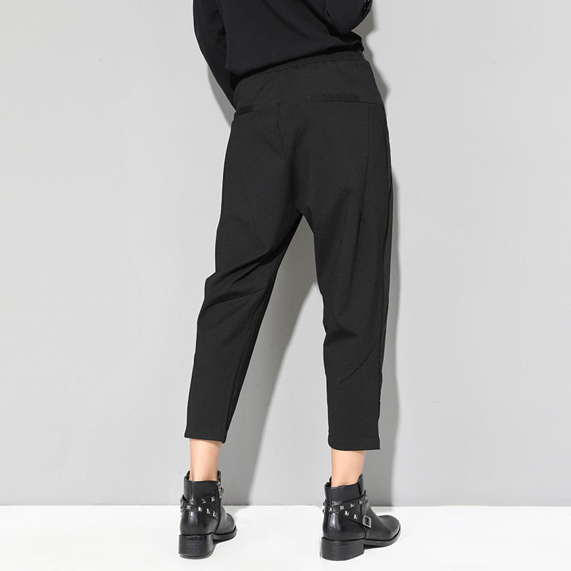 Trendy high-waisted button-front trousers for women