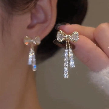 Elegant bow earrings with sparkling zirconia