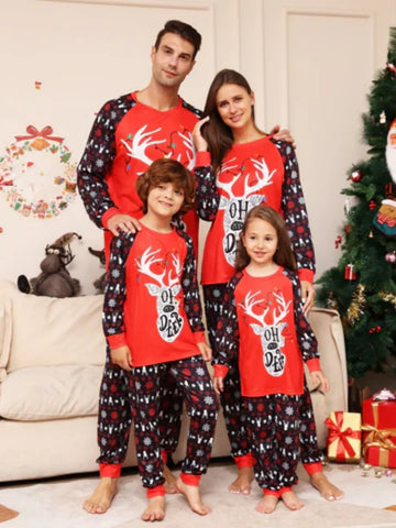 Matching red Christmas pajama sets with snow deer design