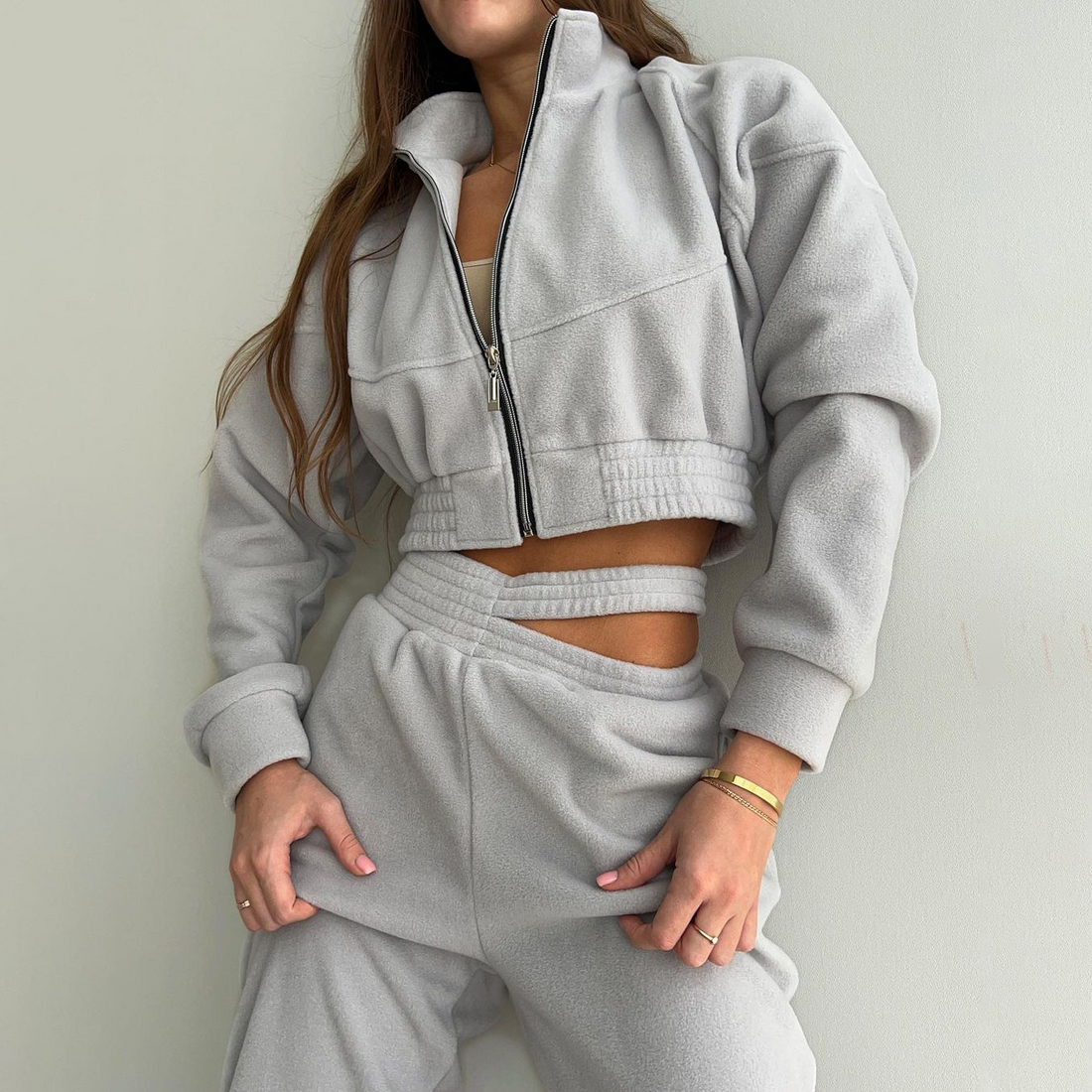 Women's fleece crop zip-up jacket with cutout waist joggers