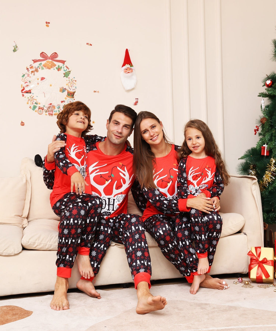 Matching red Christmas pajama sets with snow deer design